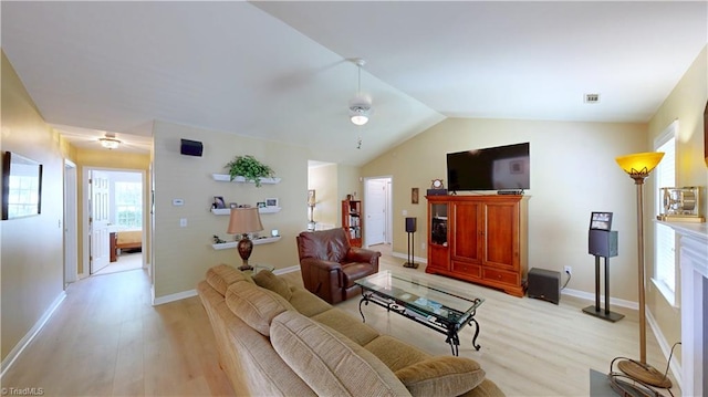 5423 Whitley Way, Greensboro, NC 27407 - living area with a ceiling fan, light wood-style flooring, healthy amount of natural light, and lofted ceiling