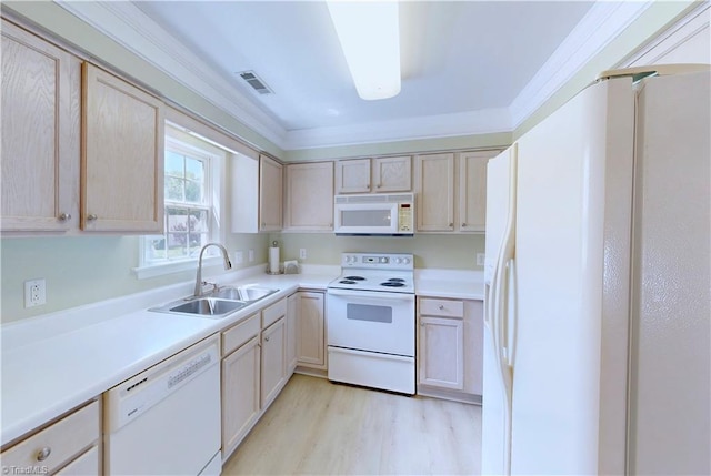 5423 Whitley Way, Greensboro, NC 27407 - kitchen featuring white appliances, light wood-style floors, light countertops, crown molding, and light brown cabinets