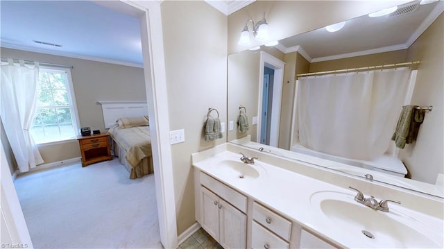 5423 Whitley Way, Greensboro, NC 27407 - bathroom featuring crown molding, double vanity, ensuite bathroom, and a shower with shower curtain