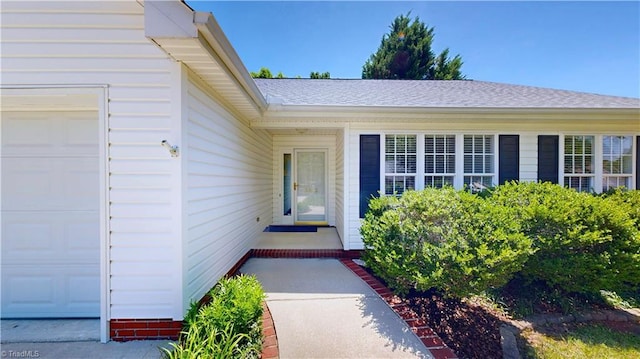 5423 Whitley Way, Greensboro, NC 27407 - view of exterior entry featuring an attached garage