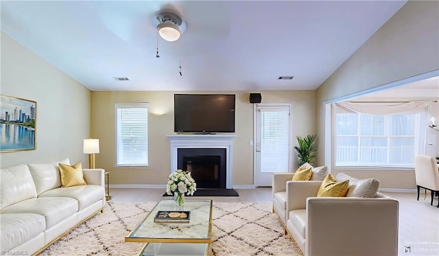 5423 Whitley Way, Greensboro, NC 27407 - living area featuring a fireplace and wood finished floors