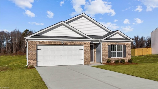 view of front of home with a front yard, concrete driveway, brick siding, and an attached garage