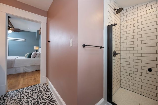 229 Orchard St, Mount Airy, NC 27030 - bathroom with a stall shower, ensuite bath, ceiling fan, and baseboards