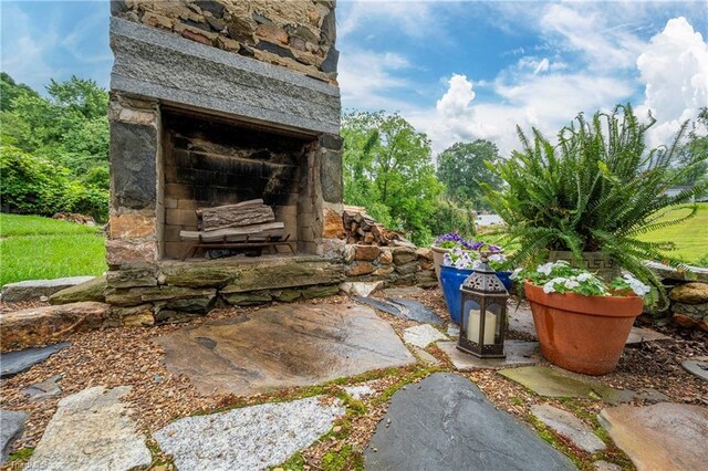 229 Orchard St, Mount Airy, NC 27030 - view of patio / terrace with an outdoor stone fireplace