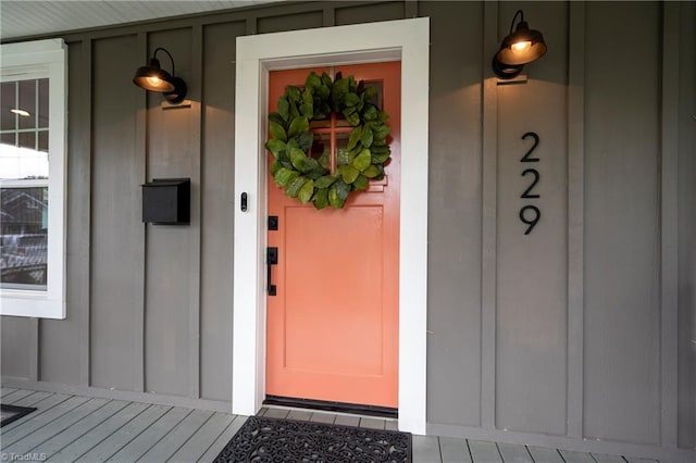 229 Orchard St, Mount Airy, NC 27030 - view of exterior entry featuring board and batten siding