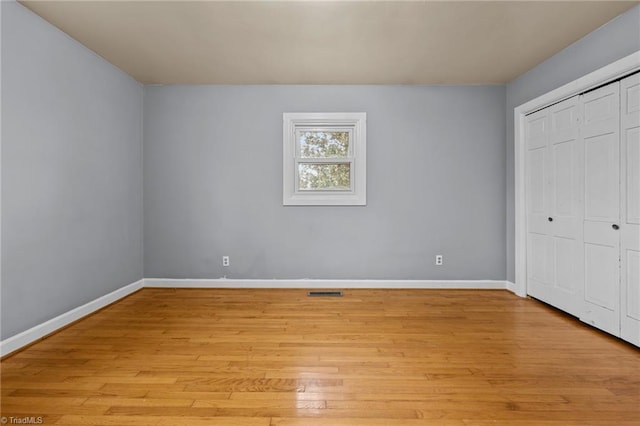 unfurnished bedroom featuring light hardwood / wood-style floors