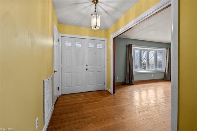 entrance foyer featuring light wood-type flooring