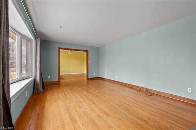 unfurnished room featuring light hardwood / wood-style flooring