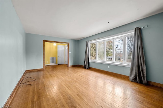 unfurnished bedroom with light wood-type flooring