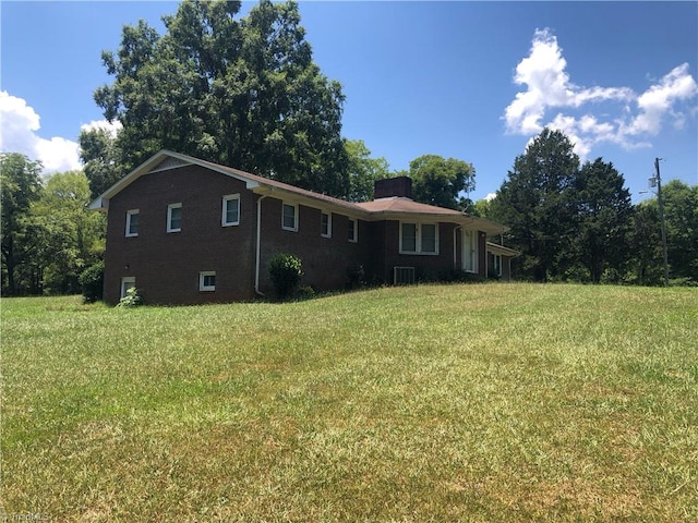 exterior space with a front lawn