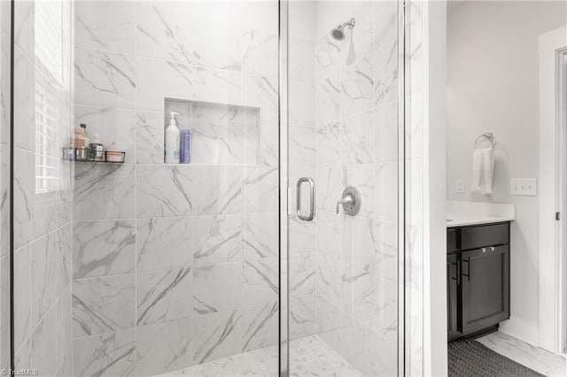 bathroom with vanity and an enclosed shower