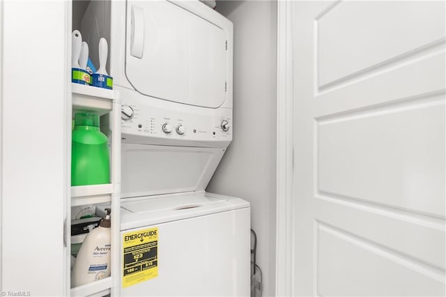 laundry room with stacked washer and clothes dryer