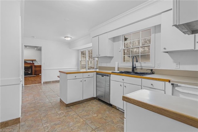 kitchen featuring crown molding, white cabinetry, stainless steel dishwasher, sink, and kitchen peninsula