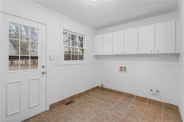 washroom with hookup for a washing machine, hookup for a gas dryer, ornamental molding, and cabinets