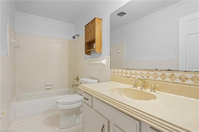 full bathroom with toilet, crown molding, tile walls, tile patterned flooring, and shower / tub combination