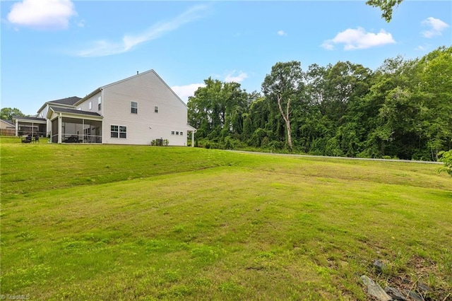 4928 Cranfill Ln, Walkertown, NC 27051 - view of green lawn featuring a sunroom