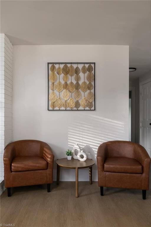 living area featuring hardwood / wood-style flooring