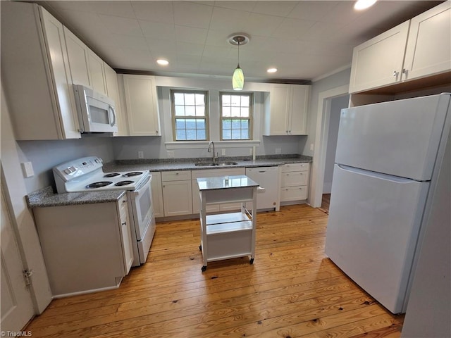 117 Hillcrest St, Jonesville, NC 28642 - kitchen with white appliances, light wood finished floors, white cabinetry, and recessed lighting