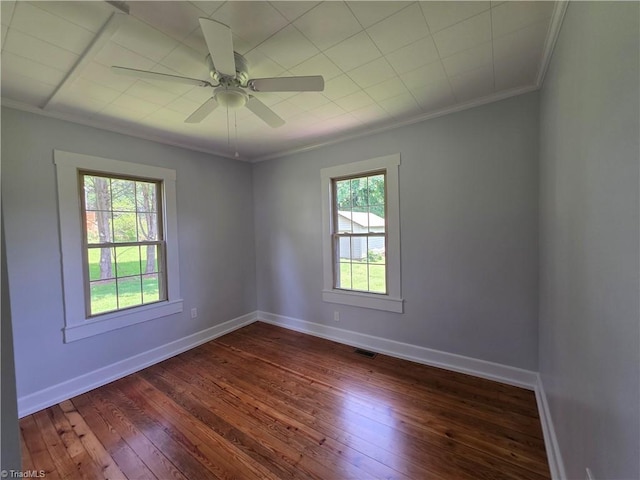117 Hillcrest St, Jonesville, NC 28642 - spare room featuring crown molding, dark wood-style floors, and ceiling fan