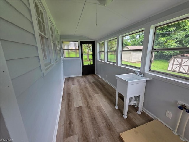 117 Hillcrest St, Jonesville, NC 28642 - unfurnished sunroom featuring wood finished floors and lofted ceiling