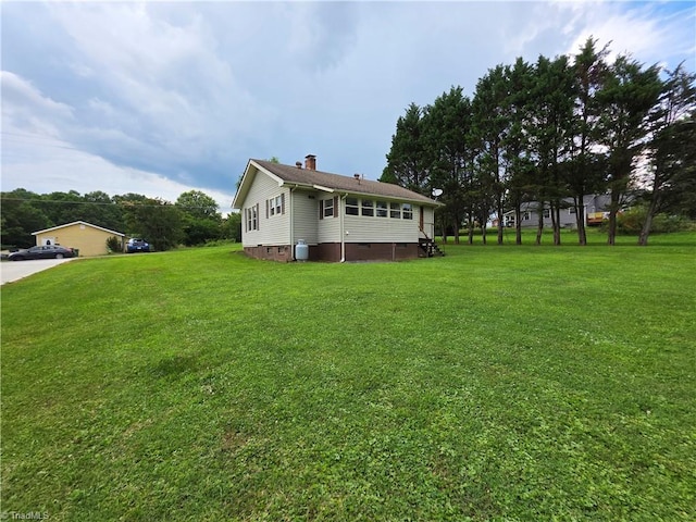 117 Hillcrest St, Jonesville, NC 28642 - view of property exterior featuring a yard and crawl space