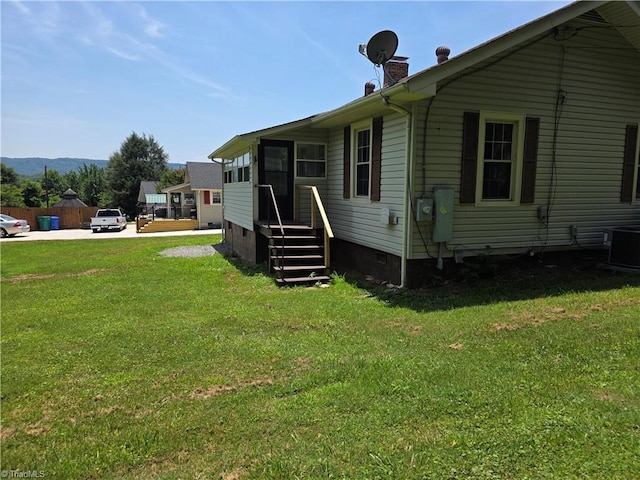 117 Hillcrest St, Jonesville, NC 28642 - view of property exterior with crawl space, a yard, and a chimney