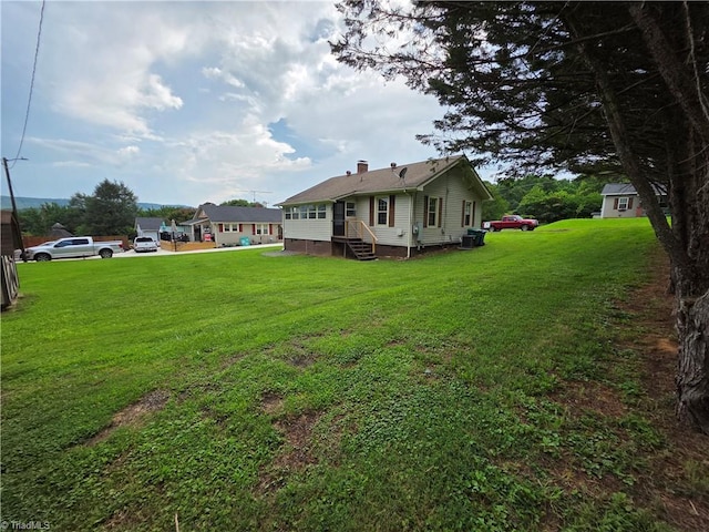 117 Hillcrest St, Jonesville, NC 28642 - view of green lawn featuring entry steps