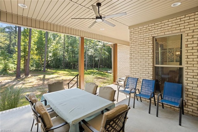 view of patio / terrace featuring ceiling fan