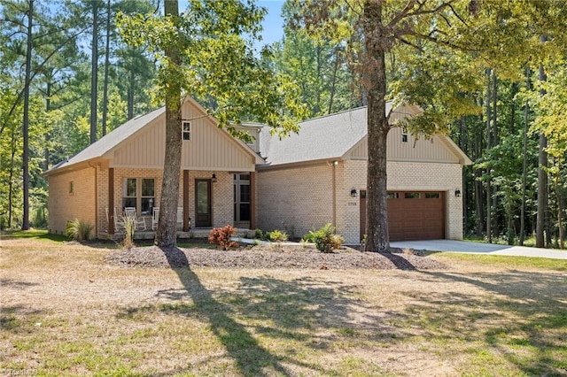 view of front of house with a porch and a garage