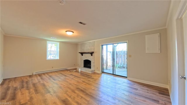 3128 Burke Mill Ct, Winston-Salem, NC 27103 - unfurnished living room with a baseboard radiator, ornamental molding, wood finished floors, and a large fireplace