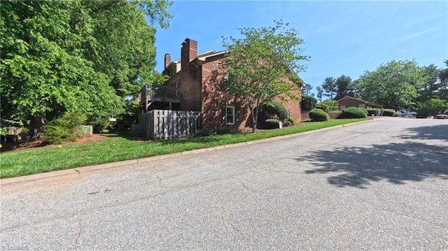 3128 Burke Mill Ct, Winston-Salem, NC 27103 - view of side of property featuring a chimney and brick siding