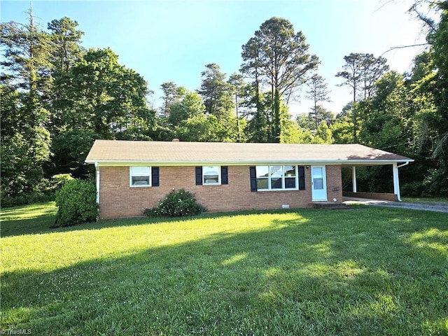 single story home featuring a carport and a front lawn