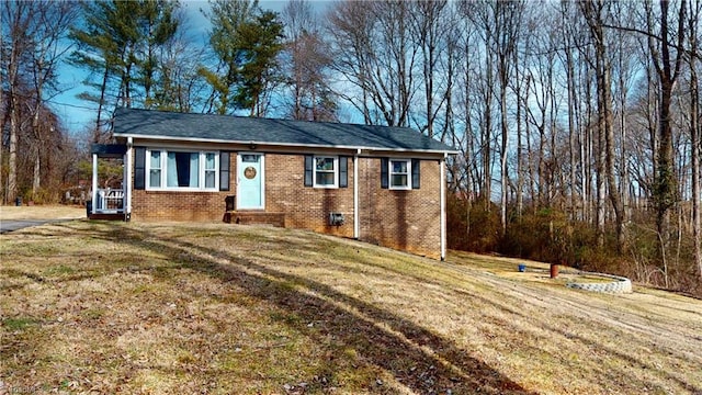 view of front of home with a front lawn