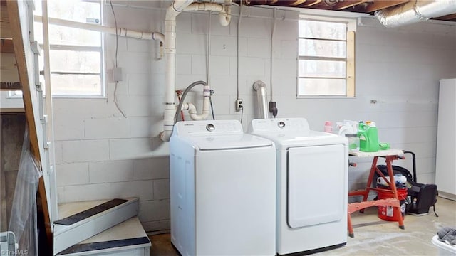 laundry room with washing machine and dryer