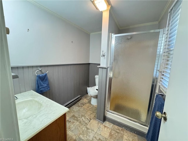 bathroom with walk in shower, a baseboard radiator, vanity, and ornamental molding