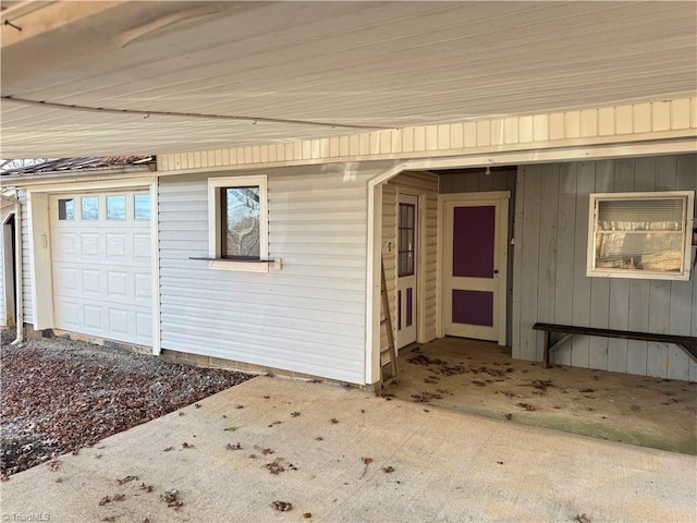 entrance to property featuring a garage