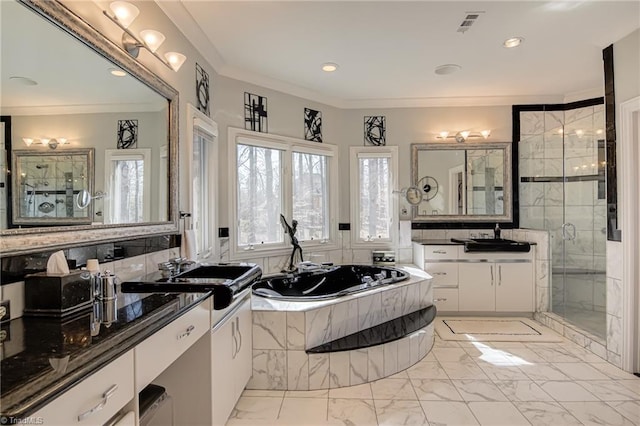 bathroom featuring a sink, ornamental molding, a shower stall, a bath, and marble finish floor