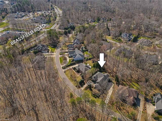 birds eye view of property with a residential view