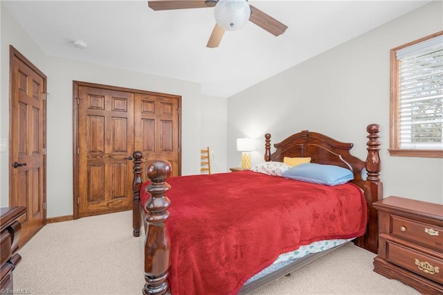 bedroom with ceiling fan and carpet