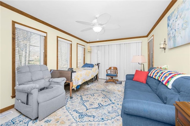 bedroom with visible vents, ornamental molding, a closet, baseboards, and ceiling fan