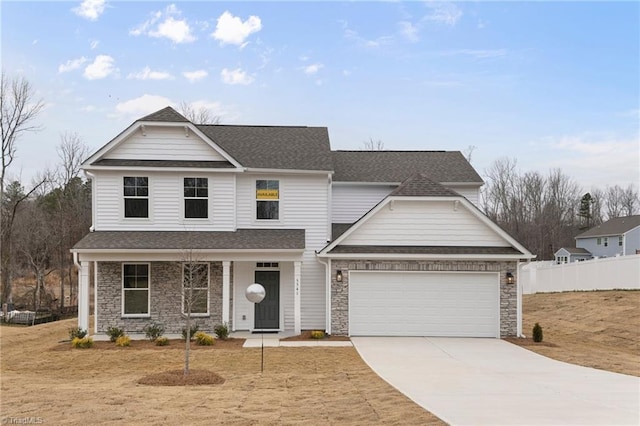 5541 Siler St, Trinity, NC 27370 - view of front facade featuring roof with shingles, a garage, fence, concrete driveway, and stone siding