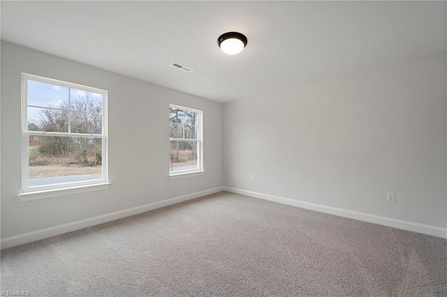 spare room with carpet flooring