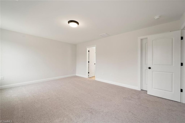 empty room with light carpet