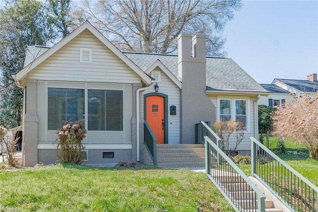 211 W 4th Ave, Lexington, NC 27292 - view of front of house featuring a chimney, a front lawn, crawl space, and roof with shingles