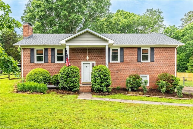 163 Ruth Ct, Winston-Salem, NC 27127 - view of front of house featuring brick siding, a chimney, and a shingled roof