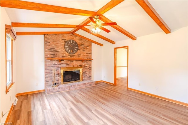 163 Ruth Ct, Winston-Salem, NC 27127 - unfurnished living room with a ceiling fan, wood finished floors, a brick fireplace, and baseboards