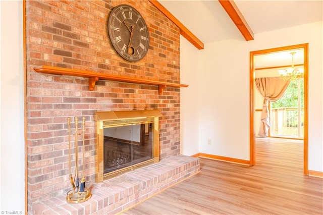 163 Ruth Ct, Winston-Salem, NC 27127 - unfurnished living room featuring baseboards, wood finished floors, and a fireplace