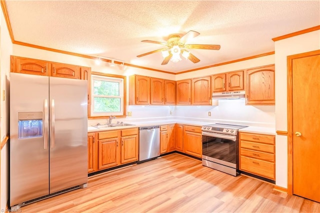 163 Ruth Ct, Winston-Salem, NC 27127 - kitchen featuring appliances with stainless steel finishes, a sink, a textured ceiling, a ceiling fan, and light wood-style flooring
