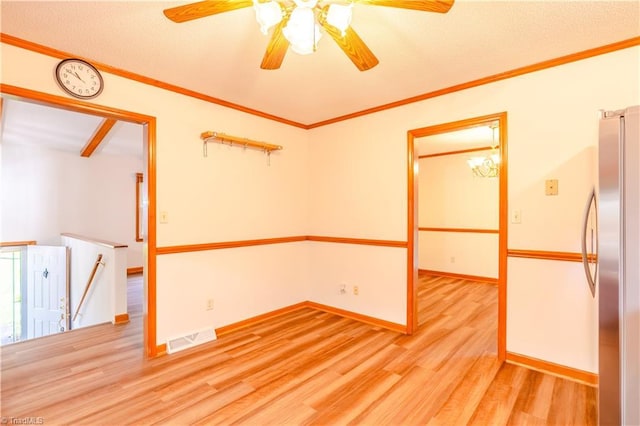 163 Ruth Ct, Winston-Salem, NC 27127 - empty room with light wood finished floors, a ceiling fan, baseboards, and ornamental molding