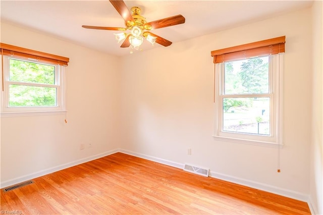 163 Ruth Ct, Winston-Salem, NC 27127 - spare room featuring light wood finished floors, baseboards, and a ceiling fan